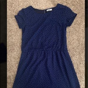 A dress size small it’s wide and from Switzerland